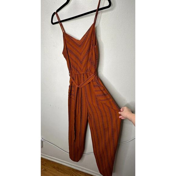 E & M Rust & Black Aztec Print V-Neck Spaghetti Strap Pockets Tie Waist Jumpsuit - Picture 1 of 16